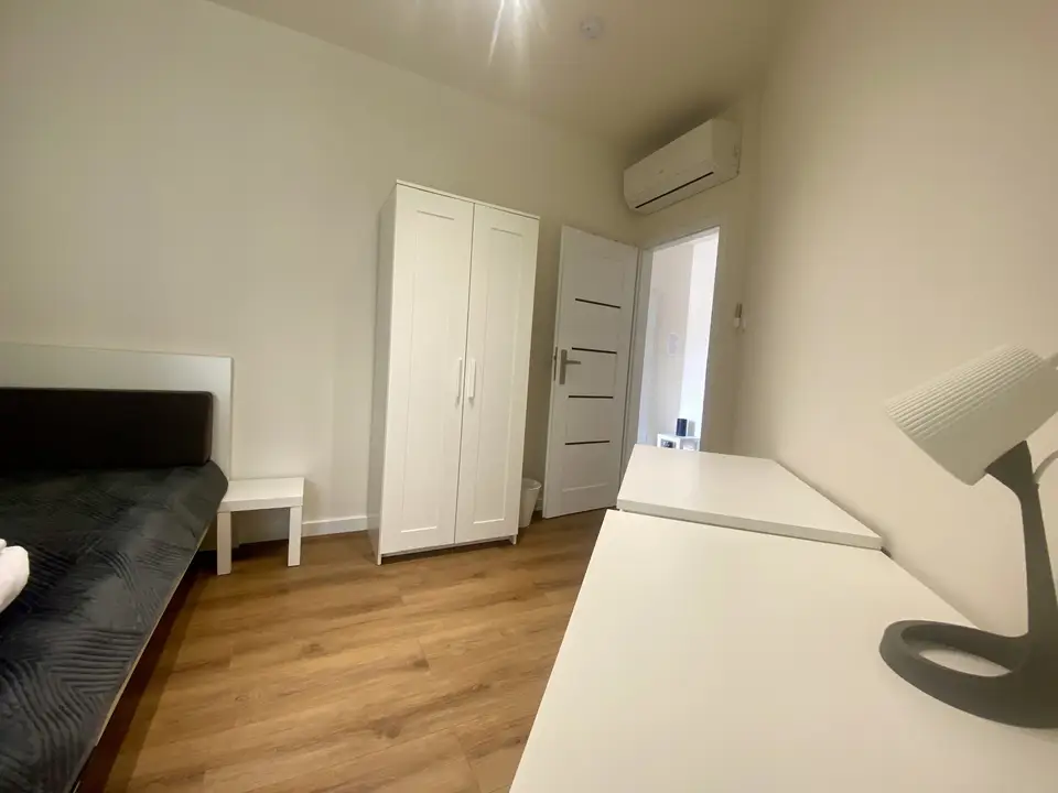 room in Wola 4