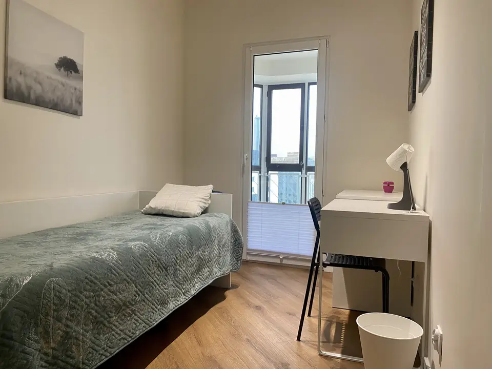 room in Wola 1