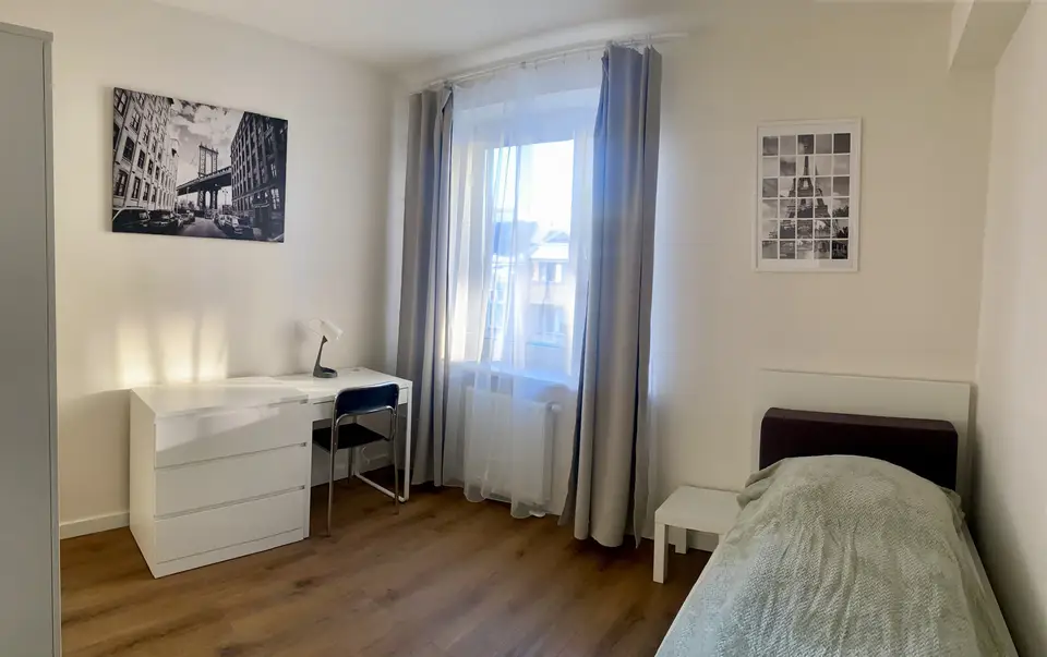 room in Wola 1