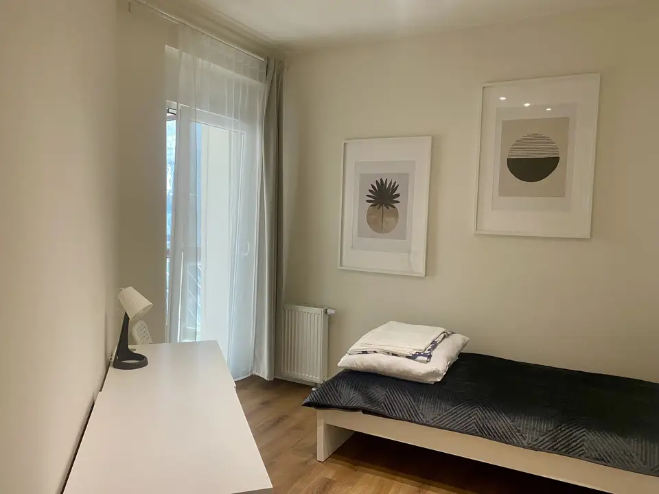 room in Wola 1