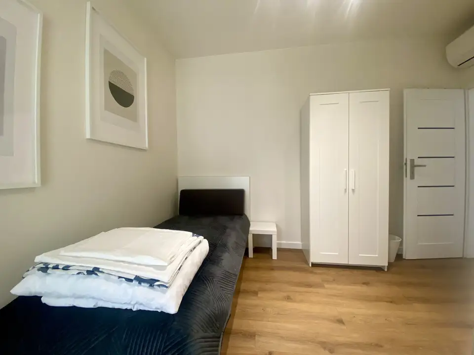 room in Wola 2